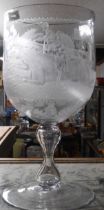 A large 19th Century glass presentation goblet, the bowl engraved to the front with a horse racing