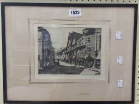 J.H. Wiley: a framed etching, depicting the Butterwalk, Dartmouth - signed and inscribed in pencil -