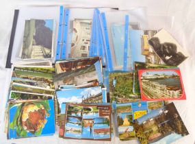 A box containing a collection of assorted 20th Century postcards - various subjects, some