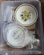 A crate containing a quantity of Portmeirion pottery, decorated in the Botanic Garden pattern