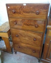 A 71cm 1920's mahogany and mixed wood tallboy with flight of four long graduated drawers, set on