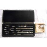A vintage cased set of drawing instruments - Lee Guinness Ltd. Belfast - sold with a chrome plate