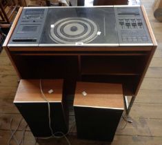 A Bang & Olufsen Beocenter 2000 record player and tape deck in wooden display stand - sold with