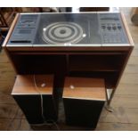 A Bang & Olufsen Beocenter 2000 record player and tape deck in wooden display stand - sold with