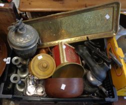 A crate containing a quantity of pewter and other metal items including a decorative brass tray, a