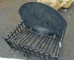 An old cast iron fire basket