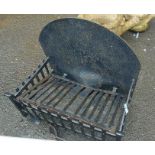 An old cast iron fire basket