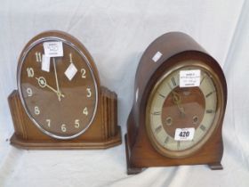 A vintage Smiths stained walnut cased mantel clock with eight day gong striking movement - sold with