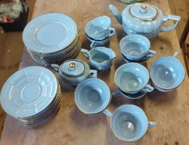 A vintage Gefle Sweden part tea set of lobed form with light blue glaze finish including eleven