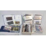 Four assorted ring bound albums containing collections of mint decimal stamp packs and prestige