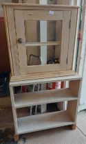 A pine open bookcase- sold with a similar cupboard (no glass)