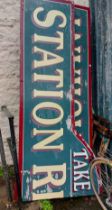A large painted wood two part 'Station Restaurant' sign - 4.9m overall length