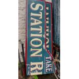 A large painted wood two part 'Station Restaurant' sign - 4.9m overall length