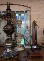 Five table lamps of various design including brass, ceramic, wood and other examples