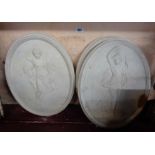 Four oval plaster plaques, depicting classical maidens