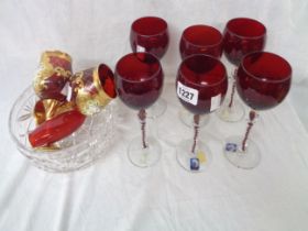 A quantity of coloured and other glassware including Venetian ruby goblets with enamel decoration,