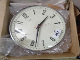 A vintage Metamec wall timepiece with electric movement - sold as a collector's item only (plastic