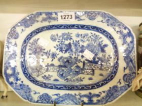 An antique Chinese porcelain small meat plate of typical form with blue hand painted floral