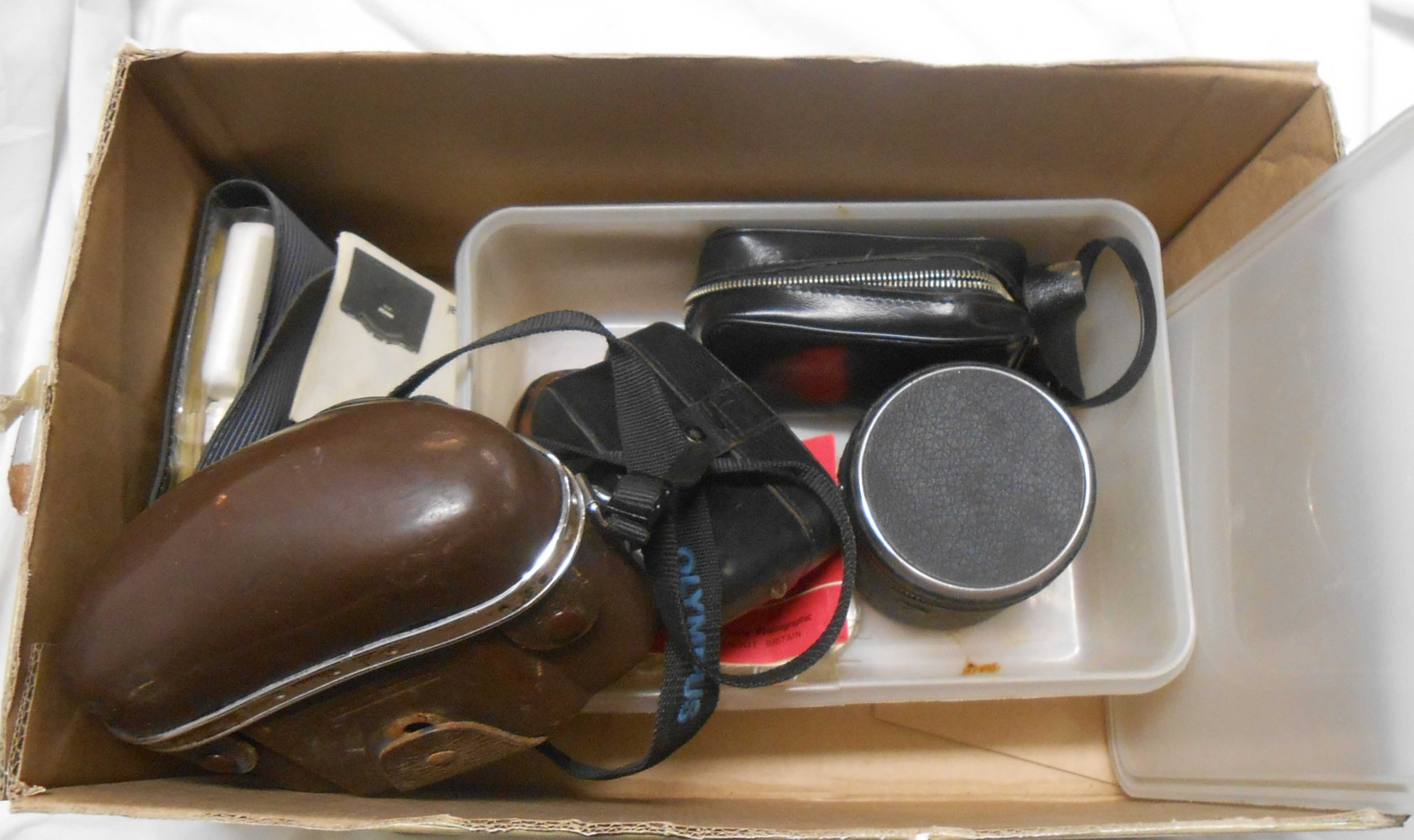 A box containing a quantity of vintage cameras and equipment including Zeiss Icon camera, etc.