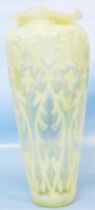 A 19th Century James Powell vaseline glass vase with internal moulded floral design