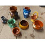 Eight mainly West Country pottery vases including Aller Vale, etc.