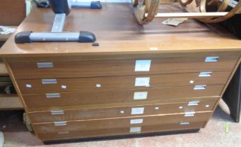 A 1.36m vintage sapele and mixed wood two part plan chest with flight of six long drawers, set on