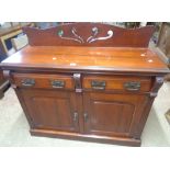 A 1.22m late Victorian stained walnut chiffonier with later added pierced raised back, two frieze