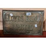 An old phosphor bronze 'Lloyds Bank Limited' sign