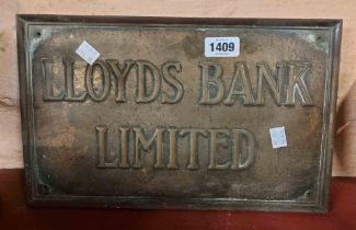 An old phosphor bronze 'Lloyds Bank Limited' sign