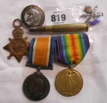 A bag containing a quantity of medals including a pair of Great War medals for PTE. A.H. Rudman on