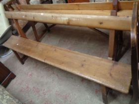 A 2.1m Victorian pine form style chapel pew with book rest to back and moulded solid seat, set on