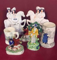 A quantity of ceramics including reproduction Staffordshire figures, Plichta tankard, etc.