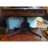 A 97cm 19th Century mahogany sofa table with two through drawers, set on turned and reeded pillar