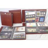 Five Royal Mail Presentation Packs ring bound albums containing a collection of mint decimal stamp