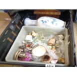 A crate containing a quantity of ceramics and other collectable items including vases, ornaments,