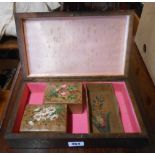 An antique wooden box with hand painted floral decoration to lid - sold with two smaller hand
