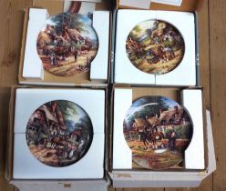 Four boxed Wedgwood collectors' plates