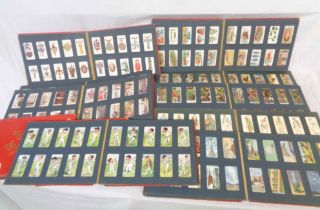 Eleven vintage 'Wills's Cigarette Card Albums' containing collections of mainly John Player and