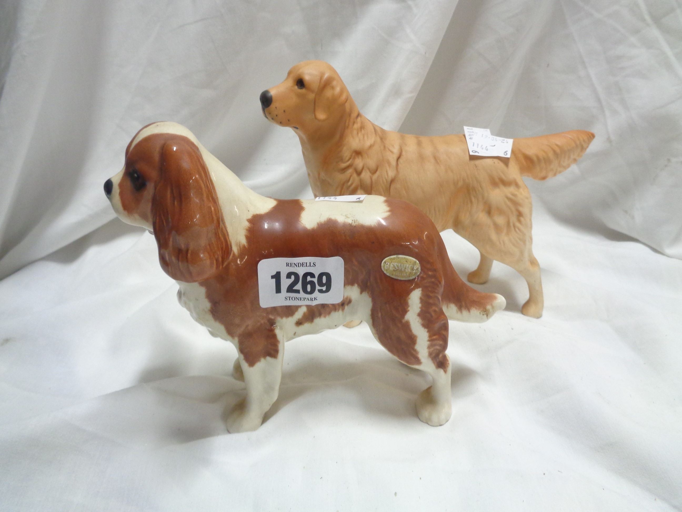 A Beswick pottery King Charles Spaniel figure - sold with a matt glazed Golden Retriever figure