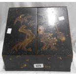 An early 20th Century Oriental black lacquered stationery box with fitted interior - a/f