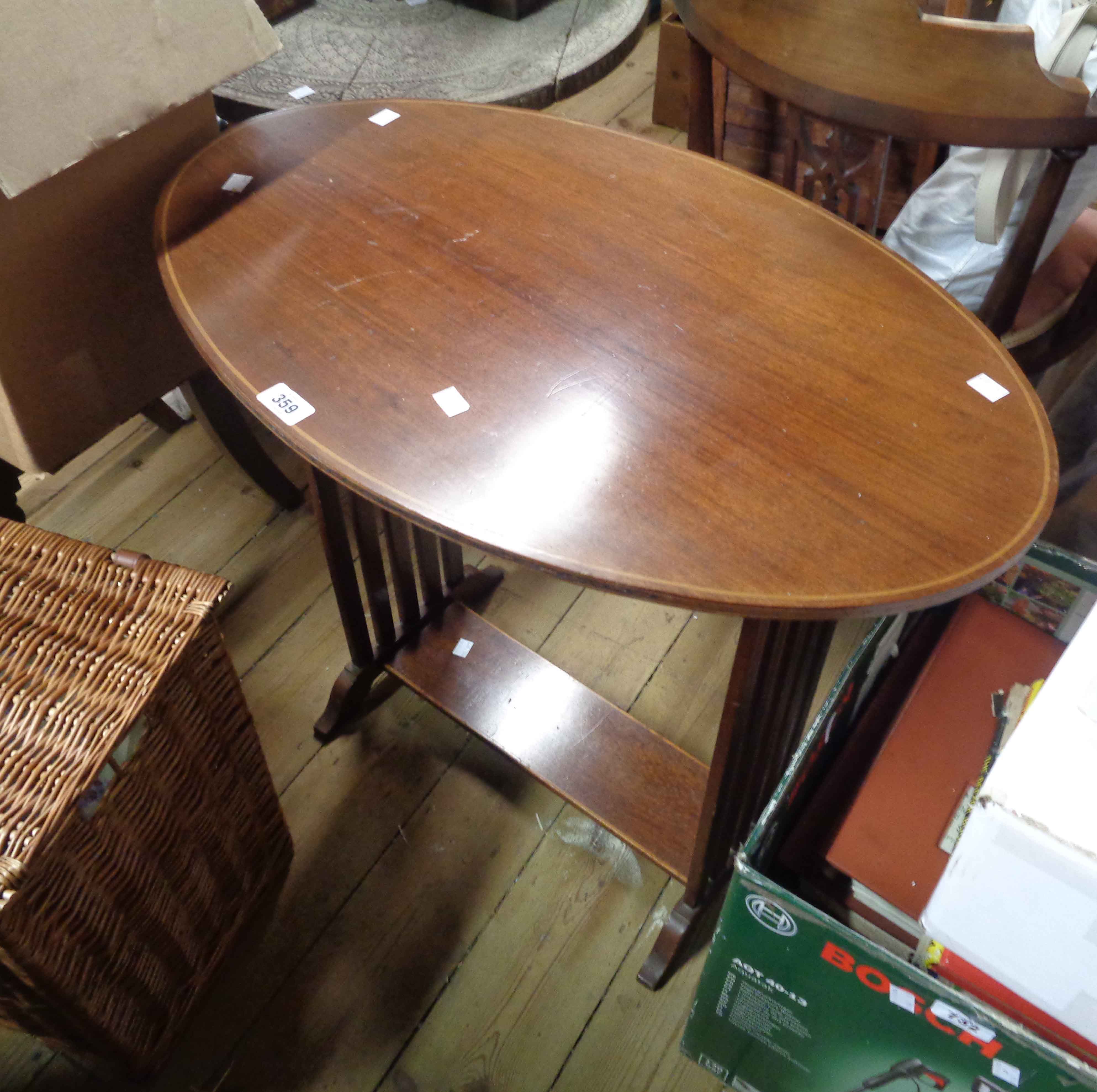 A 70cm Edwardian mahogany and strung tea table, set on slatted standard ends