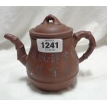 A Chinese Yixing Zisha clay teapot with incised calligraphic and bamboo decoration with internal