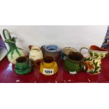 Eight small West Country pottery jugs including Torquay, Baron, Barnstaple, etc.