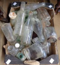 A box containing a quantity of vintage bottles