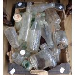 A box containing a quantity of vintage bottles