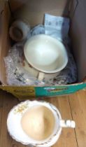 A box containing a quantity of ceramics including toilet jug, bowls, etc.