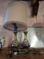 A pair of large German brass table lamps of vase form with chased decorative belt - sold with