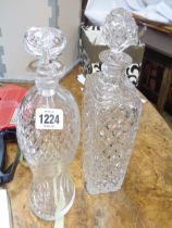 Two cut glass decanters