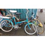 A vintage Raleigh bicycle in maroon colourway - sold with another similar in teal colourway