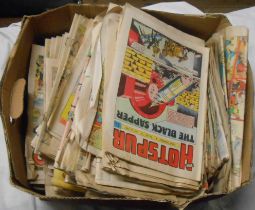 A box containing a quantity of vintage comics including The Beano, The Hotspur, The Topper, etc.